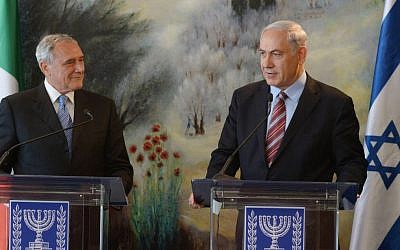 Israeli Prime Minister Benjamin Netanyahu holds a joint press conference with Pietro Grasso, President of the Italian Senate, in the Israeli parliament on June 25, 2014. (photo credit: Amos Ben Gershom/GPO/FLASH90)