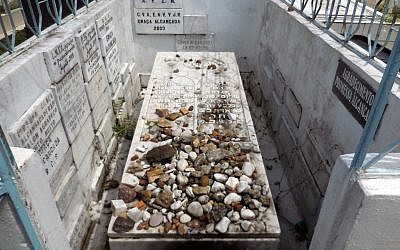 The tomb of Rabbi Shalom Imanuel Muyal, who died of yellow fever in 1910, lays at Saint John the Baptist Cemetery in Manaus, Friday, June 20, 2014. (photo credit:AP/Chris Lehourites)