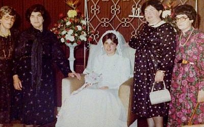 At a family wedding in Israel, Regina Ament, right, is shown with her sisters, from left, Feige, Baila and Hinda. (Courtesy Chanoch Korman/via JTA)