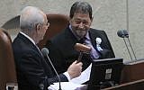 Israel's then-president Shimon Peres (L) seen with Labor MK Binyamin Ben-Eliezer at the opening session of the Knesset on February 05, 2013. (photo credit: Miriam Alster/FLASH90)