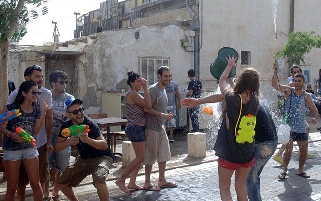A water fight in Beersheba on Shavuot (photo credit: Dudu Greenspan/Flash90)