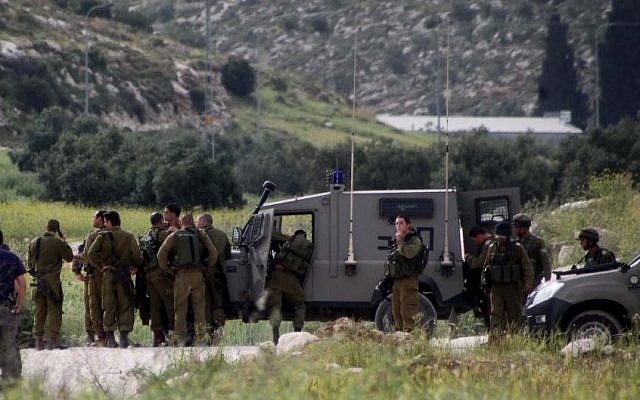 Israeli troops group near Hebron, file photo (Photo credit: Issam Rimawi/Flash90)