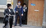 Extra police deploy in Belgium after a May 2014 attack at the Jewish museum in Brussels. (Joods Actueel/Flash90)