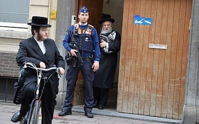 Extra police deploy in Belgium after a May 2014 attack at the Jewish museum in Brussels. (Joods Actueel/Flash90)