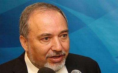 Foreign Minister Avigdor Liberman speaks with the press before entering the weekly cabinet meeting on Sunday, June 1, 2014. (photo credit: Marc Israel Sellem/POOL/Flash 90)