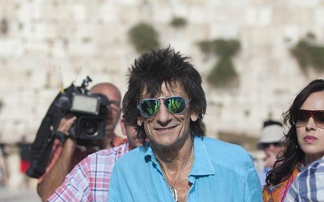 Ronnie Wood, guitarist for The Rolling Stones, seen visiting the Western Wall in Jerusalem's Old City on Tuesday, June 3, 2014, a day before the band's concert in Tel Aviv (Photo credit: Yonatan Sindel/Flash 90) Ronnie Wood, guitarist for The Rolling Stones, seen visiting the Western Wall in Jerusalem's Old City on Tuesday, June 3, 2014, a day before the band's concert in Tel Aviv (Photo credit: Yonatan Sindel/Flash 90)
