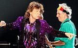 Mick Jagger (L) and Keith Richards (R), on stage during the Rolling Stones concert in Tel Aviv, Israel, on June 4, 2014. (Photo credit: Flash 90)