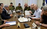 File - Prime Minister Benjamin Netanyahu meets with then-IDF chief of staff Benny Gantz, defense minister Moshe Ya'alon, Shin Bet head Yoram Cohen, Mossad director Tamir Pardo, and NSC head Yossi Cohen at the Defense Ministry in Tel Aviv, to discuss the disappearance of three Jewish teenagers near Hebron, in the West Bank, June 14, 2014. (Kobi Gideon/GPO/Flash90)