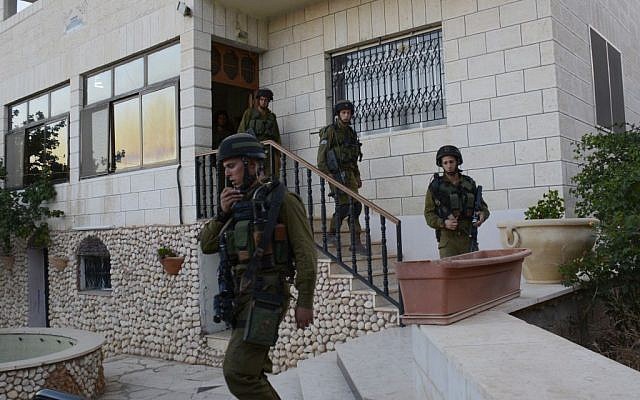 Israeli soldiers from the IDF Kfir brigade seen in the Jilazun refugee camp, near the West bank city of Hebron, during search efforts for three kidnapped Jewish teenagers, on June 16, 2014 (photo credit: IDF spokesperson/Flash90) Israeli soldiers from the IDF Kfir brigade seen in the Jilazun refugee camp, near the West bank city of Hebron, during search efforts for three kidnapped Jewish teenagers, on June 16, 2014 (photo credit: IDF spokesperson/Flash90)