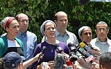 Rachelle Fraenkel, mother of kidnapped Israeli youth Naftali, speaks to the press outside her house on Tuesday, June 16, 2014. She is flanked by the parents of two other teens kidnapped with her son, Gil-ad Shaar and Eyal Yifrach. (photo credit: Yossi Zeliger/Flash90)