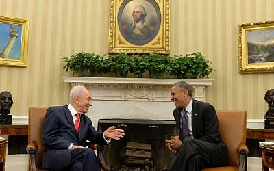 President Shimon Peres meets with US President Barack Obama, at the White House in Washington DC, on June 25, 2014. (Photo credit: Kobi Gideon /GPO/FLASH90)