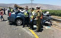 A fatal crash near Kfar Manda on June 26, 2914. (photo credit:  Aharon Baruch Leibowitz/ZAKA/FLASH90)