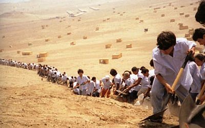 Francis Alÿs: When Faith Moves Mountains, 2002.  (Courtesy Francis Alÿs and David Zwirner, New York)
