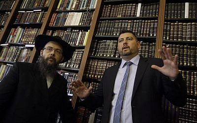 Csanad Szegedi, right, speaks with Chief Chabad Rabbi Boruch Oberlander in Budapest, on May 30, 2014. (photo credit: AP Photo/Peter Kohalmi) Csanad Szegedi, right, speaks with Chief Chabad Rabbi Boruch Oberlander in Budapest, on May 30, 2014. (photo credit: AP Photo/Peter Kohalmi)