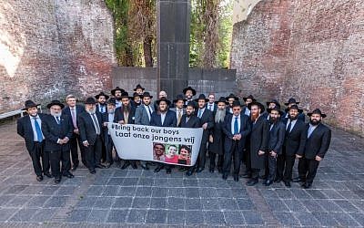 Illustrative: Rabbis from the Rabbinical Center of Europe gather in Amsterdam to show support for Israel when three teenagers were kidnapped and murdered in the West Bank, June 18, 2014. (photo credit: Rabbinical Center of Europe)