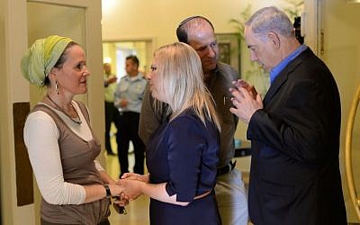Prime Minister Benjamin Netanyahu and wife, Sara, meet June 20 with Rachel and Avi Fraenkel, the parents of Naftali Fraenkel, 16, who was kidnapped in the West Bank on June 12, 2014, along with Gil-ad Shaar and Eyal Yifrach. June 20, 2014. (Photo credit: Kobi Gideon/GPO)