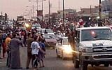 Militants parade down a main road in Mosul, Iraq, on Wednesday, June 11, 2014. (photo credit: AP/militant source via Twitter)