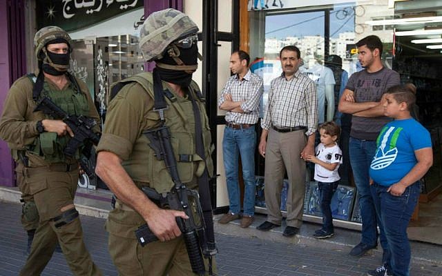 Illustrative photo of IDF soldiers, June 19, 2014 (AP Photo/Majdi Mohammed)