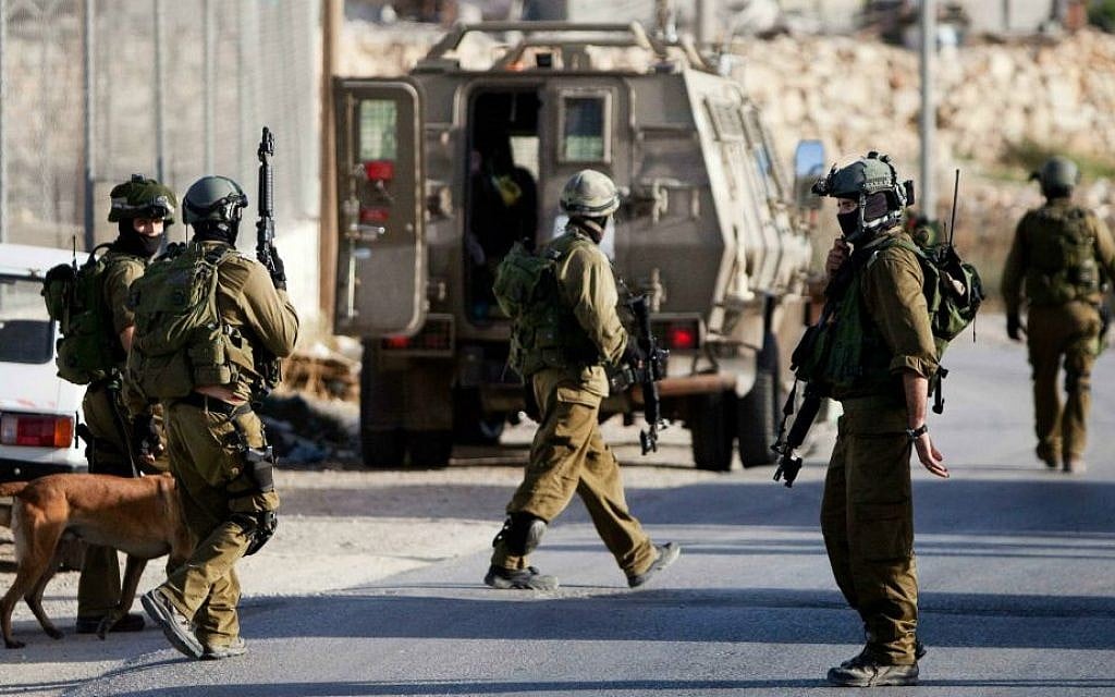 Illustrative photo of the IDF in the West Bank. June 19, 2014. (photo credit: AP/Majdi Mohammed)