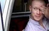 In this image taken from video, Sgt. Bowe Bergdahl sits in a vehicle guarded by the Taliban in eastern Afghanistan, just before his release into the custody of US special forces, May 31, 2014. (photo credit: Voice Of Jihad Website via AP video)