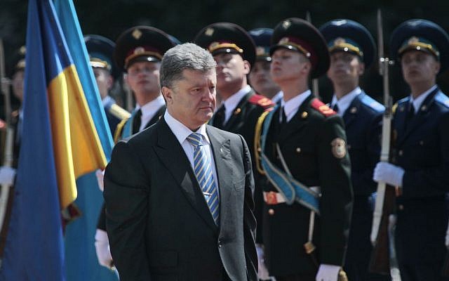Ukrainian President Petro Poroshenko reviews an honor guard after the inauguration ceremony in Sophia Square in Kiev, Ukraine, Saturday, June 6, 2014. (photo credit: AP/Sergei Chuzavkov)