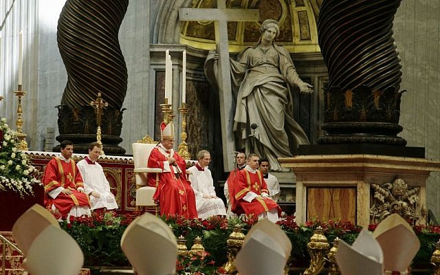 Pope Francis, background center, celebrates a mass of Pentecost in St. Peter's Basilica, at the Vatican, June 8, 2014. (photo credit: AP/Gregorio Borgia)