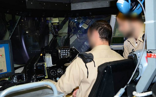 IAF officers inspect equipment in a plane set to be refurbushed by Base 108 personnel. Faces are blurred for security reasons (Photo credit: Courtesy) IAF officers inspect equipment in a plane set to be refurbushed by Base 108 personnel. Faces are blurred for security reasons (Photo credit: Courtesy)