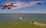 An AirDog (top left) follows some extreme windsurfers, taking video of the their stunts (Photo credit: Courtesy)