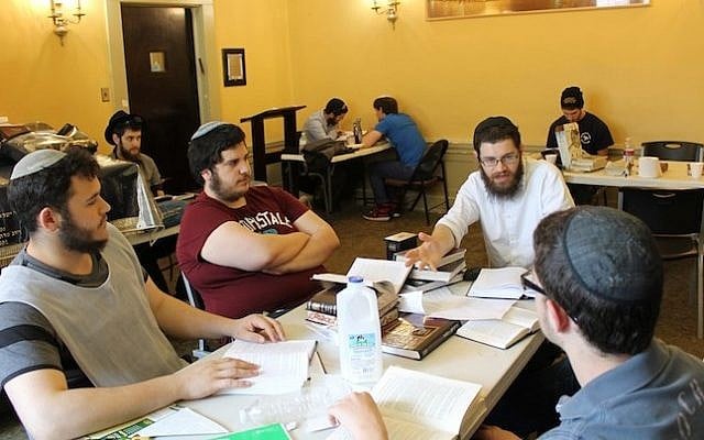 Most of the Torah study at the yeshiva in Wilkes-Barre takes place in small groups. (photo credit: Uriel Heilman/JTA)