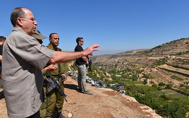 Yaalon in the Hebron region with the Kfir Brigade commanders on Monday photo credit: Ariel Hermoni/ Ministry of Defense)