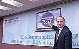 The director-general of investment promotion, Simon Galpin, introduces the launch of Invest Hong Kong's 2014 StartMeUpHK Venture Program (Photo credit: Courtesy)