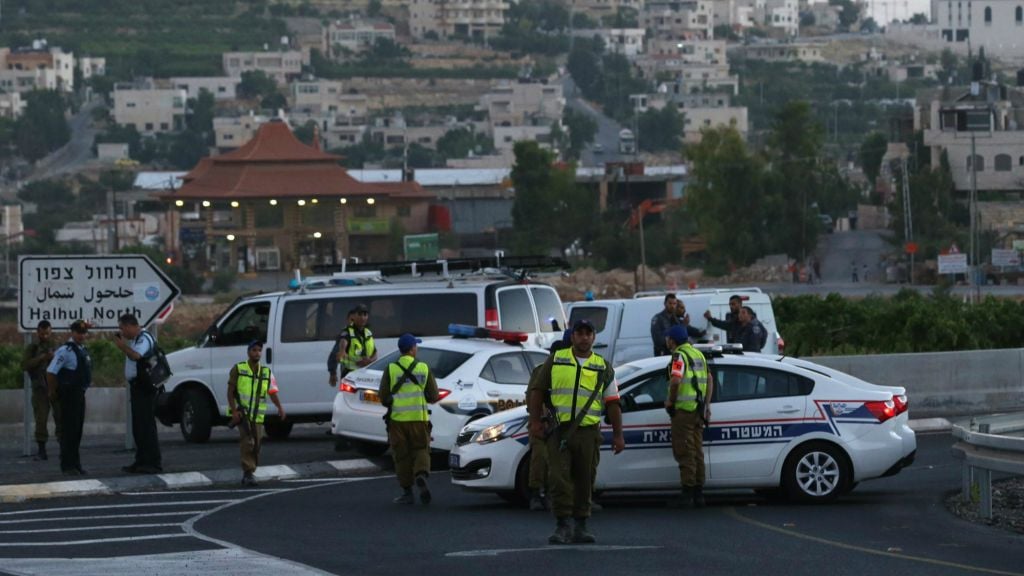 Israeli soldiers seen in the Palestinian village of Halhul, near the West Bank city of Hebron, close to where the bodies of three young Jewish teenagers Eyal Yifrah, Naftali Frenkel and Gilad Sha'ar were found on June 30, 2014 (photo credit: Nati Shohat/Flash90) Israeli soldiers seen in the Palestinian village of Halhul, near the West Bank city of Hebron, close to where the bodies of three young Jewish teenagers Eyal Yifrah, Naftali Frenkel and Gilad Sha'ar were found on June 30, 2014 (photo credit: Nati Shohat/Flash90)