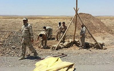 Illustrative: Kurdish security forces prepare combat positions outside the oil-rich city of Kirkuk, 180 miles (290 kilometers) north of Baghdad, Iraq, Thursday, June 19, 2014. (AP)