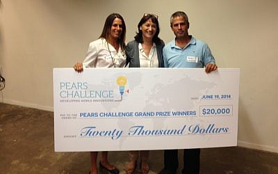 Nitzan Solan (L) and  Mendi Pollak (R) flank Dr. Aliza Belman Inbal, who presents them with the $20,000 Pears Challenge award for Livingbox (Photo credit: Courtesy)