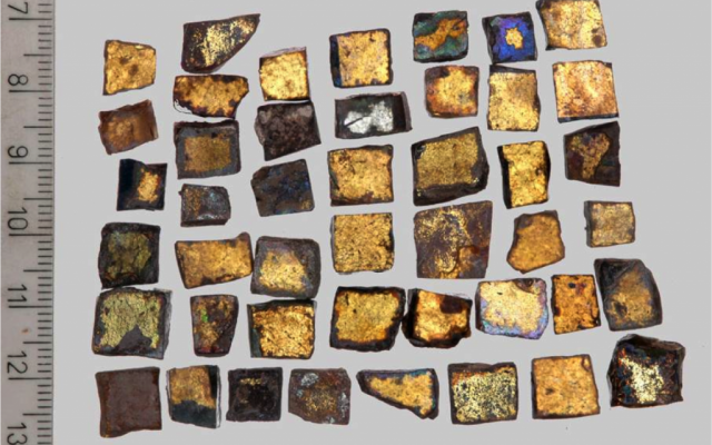Gilt mosaic tiles that once decorated the Dome of the Rock on the Temple Mount (photo credit: Courtesy of The Temple Mount Sifting Project)