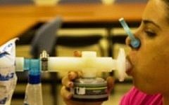 A patient uses the NaNose breathalyzer (Photo credit: Courtesy Technion)