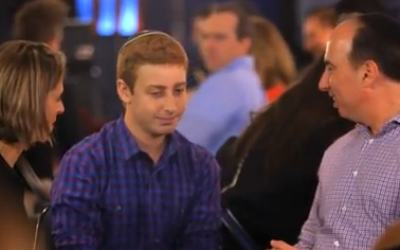 Josh Orlian (center) sits with his parents before taking the stage on 'America's Got Talent,' June 17, 2014. (screen capture: YouTube/America's Got Talent)