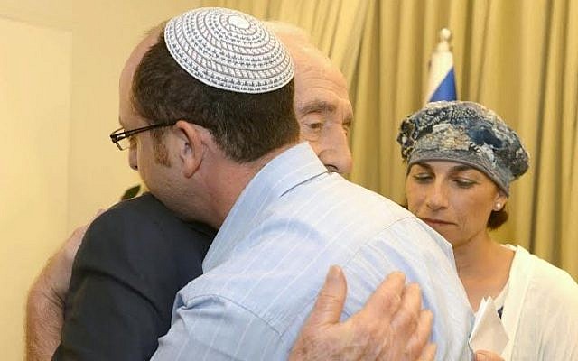 President Shimon Peres meets with families of kidnapped Jewish teenagers at the President's Residence in Jerusalem on June 19, 2014. (photo credit: Mark Neyman/GPO/Flash90) President Shimon Peres meets with families of kidnapped Jewish teenagers at the President's Residence in Jerusalem on June 19, 2014. (photo credit: Mark Neyman/GPO/Flash90)