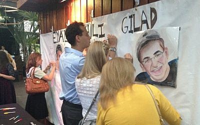 Young New York professionals raise awareness of the three kidnapped Israeli teens at a fundraiser Wednesday June 25, 2014. (Rebecca Borison/The Times of Israel)