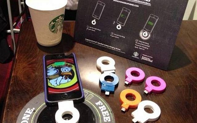 A cellphone recharging on a Powermat Spot at a California Starbucks (Photo credit: Courtesy) A cellphone recharging on a Powermat Spot at a California Starbucks (Photo credit: Courtesy)