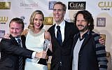 From left, Rian Johnson, Emily Blunt, James D. Stern and Ram Bergman pose backstage with the award for best sci-fi/horror movie for "Looper" backstage at the 18th Annual Critics' Choice Movie Awards at the Barker Hangar on Thursday, Jan. 10, 2013, in Santa Monica, Calif. (Photo by John Shearer/Invision/AP)