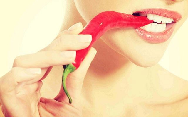 Spicy chili pepper via Shutterstock. Spicy chili pepper via Shutterstock.