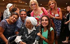 Talia Byrnes, bottom right, poses with her great-grandmother and other family members. (photo credit: Photo by Nir Shaanani)