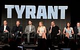 From left, executive producers Howard Gordon and Gideon Raff and cast members Adam Rayner, Jennifer Finnigan, Ashraf Barhom, Moran Atias and Justin Kirk participate in the "Tyrant" panel at the FX Winter TCA Press Tour, on Tuesday, January 14, 2014 at the Langham Huntington, in Pasadena, Calif. (Photo by Phil McCarten/Invision for FOX/AP Images)