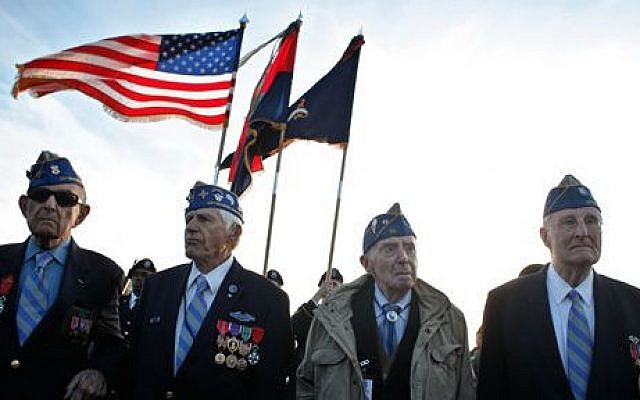 Illustrative: World War II veterans of the US 29th Infantry Division (from left) Hal Baumgarten, 90, from Pennsylvania, Steve Melnikoff, 94, from Maryland, Don McCarthy, 90, from Rhode Island, and Morley Piper, 90, from Massachusetts, attend a D-Day commemoration on Omaha Beach, western France, Friday June 6, 2014. (AP/Thibault Camus) Illustrative: World War II veterans of the US 29th Infantry Division (from left) Hal Baumgarten, 90, from Pennsylvania, Steve Melnikoff, 94, from Maryland, Don McCarthy, 90, from Rhode Island, and Morley Piper, 90, from Massachusetts, attend a D-Day commemoration on Omaha Beach, western France, Friday June 6, 2014. (AP/Thibault Camus)