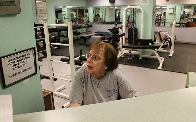 Shirley Schoenholtz, who works in the JCC's fitness center, is skeptical of the plan to build a new $11 million Center for Jewish Life. 'What do we need a new one for?' she asks. (Uriel Heilman/JTA)
