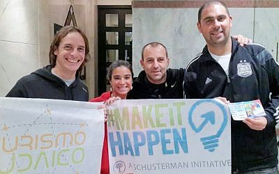 Left to right, Mariano Schlez and Paola Salem, with Damian Beker and Maxi Klein, organized efforts to bring together Jewish soccer fans at the World Cup's seven sites in Brazil. (Courtesy Paola Salem/JTA)