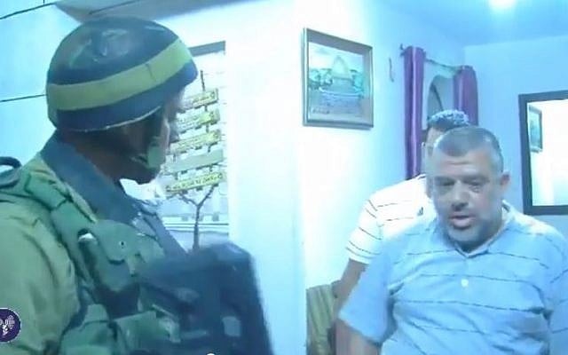 The arrest of Hassan Yousef by IDF troops following the abduction of three Israeli teenagers, June 15 2014. (screen capture: YouTube/video line) The arrest of Hassan Yousef by IDF troops following the abduction of three Israeli teenagers, June 15 2014. (screen capture: YouTube/video line)