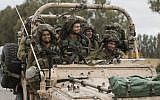 Israeli soldiers patrol along the southern Israeli border with the Gaza Strip, July 17, 2014 (photo credit: AFP/JACK GUEZ)