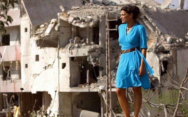 Lebanese actress Nada Abu Farhat in the southern Lebanese town of Sidiqin, during the shooting of 'Summer Rain' by Director Philippe Aractingi. Lebanon's civil war ended a quarter of a century ago but its filmmakers remain fixated on this dark period, seeing their movies as a kind of catharsis to help heal collective trauma. (photo credit: AFP photo/Patrick Baz) Lebanese actress Nada Abu Farhat in the southern Lebanese town of Sidiqin, during the shooting of 'Summer Rain' by Director Philippe Aractingi. Lebanon's civil war ended a quarter of a century ago but its filmmakers remain fixated on this dark period, seeing their movies as a kind of catharsis to help heal collective trauma. (photo credit: AFP photo/Patrick Baz)